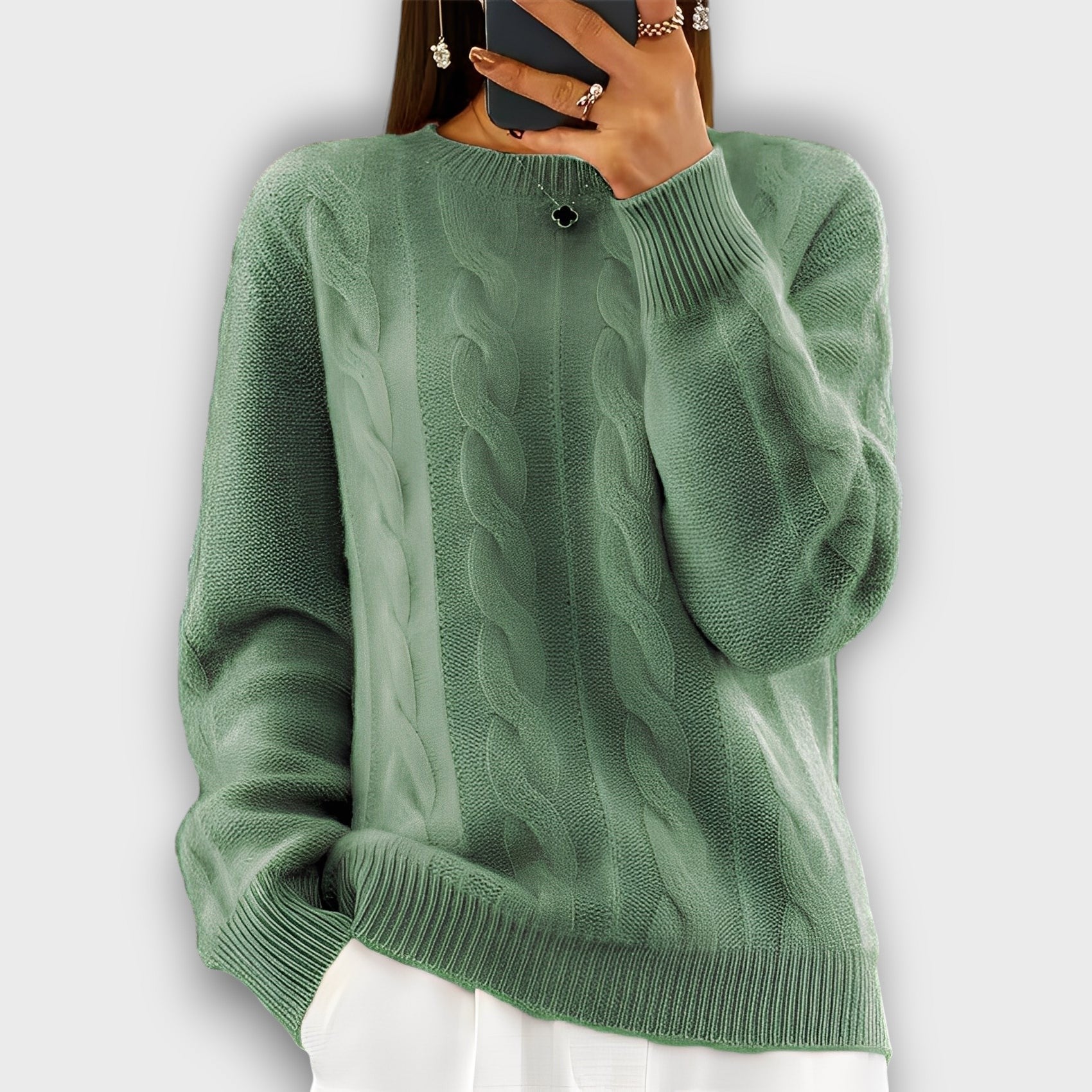 Pull femme style torsadé