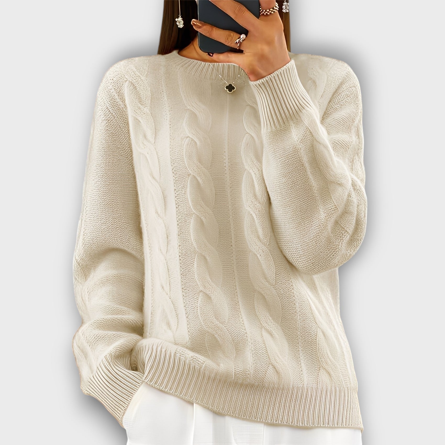 Pull femme style torsadé