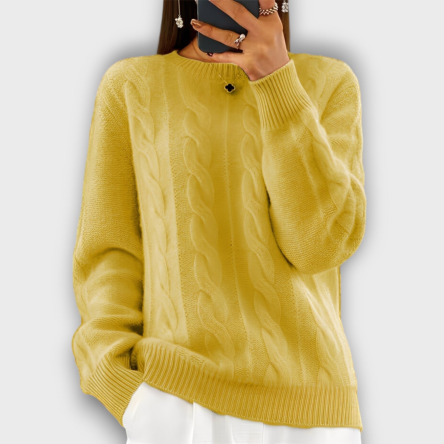 Pull femme style torsadé