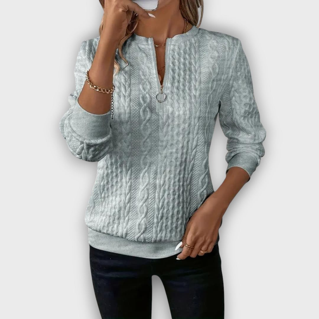 Pull femme en maille torsadée