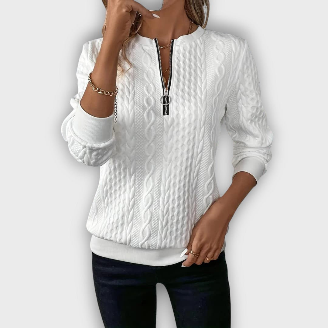 Pull femme en maille torsadée