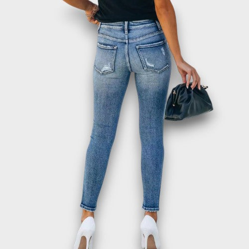 Jean skinny taille haute à boutons (femme)