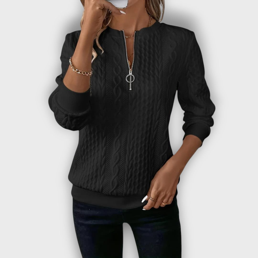 Pull femme en maille torsadée
