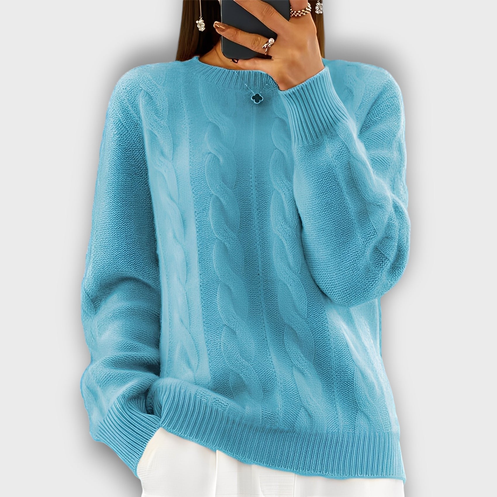 Pull femme style torsadé