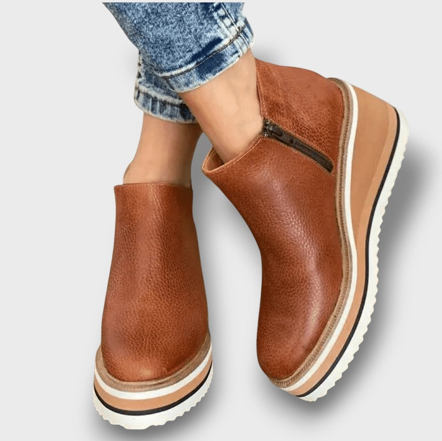 Bottines à semelle compensée avec fermeture éclair (femme)